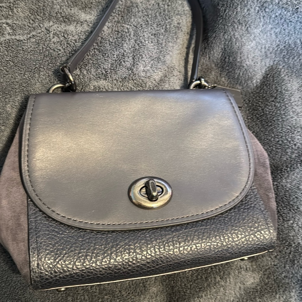 Coach bag, no long strap, color is dark gray